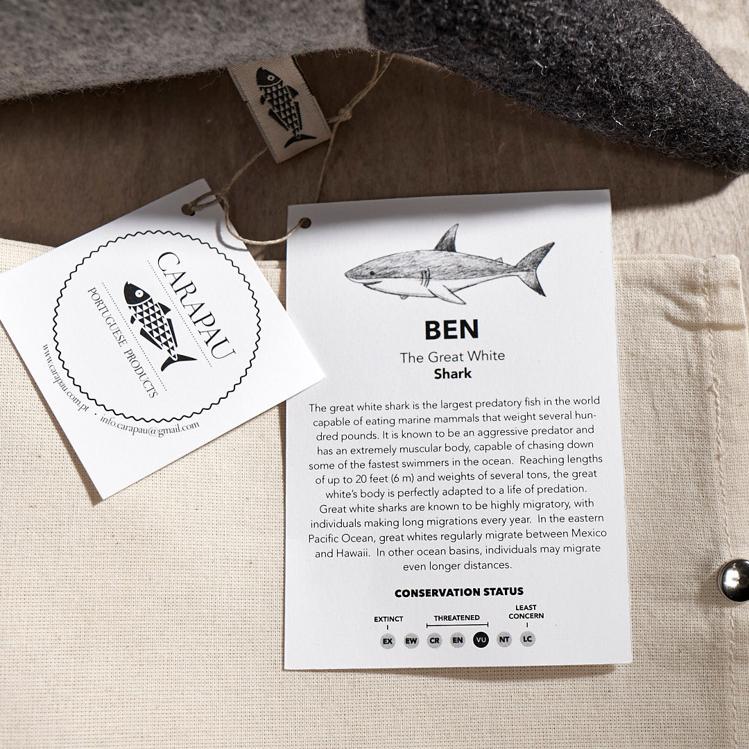 A tag with the word BEN, the Great White Shark on it by Carapau.
