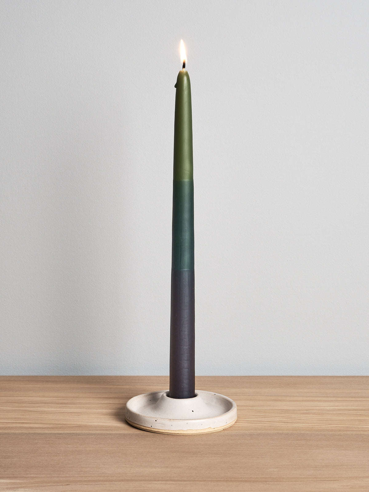 A Candle Holder – Cloud sitting on top of a wooden table by deborah sweeney.