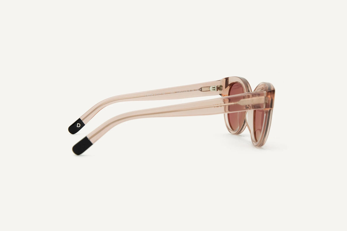 A pair of Paris Sunglasses – Pale Rose by Dick Moby on a white background.