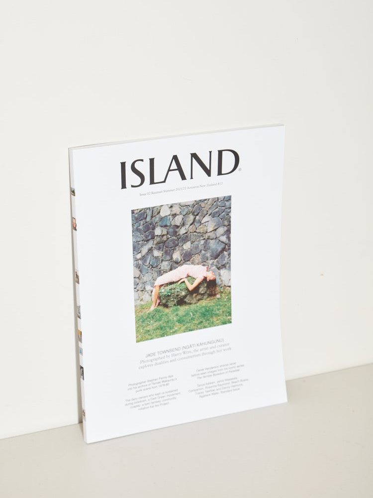 The cover of ISLAND Magazine – Issue 02 (Summer 2021/22) from ISLAND Magazine is sitting on a table.