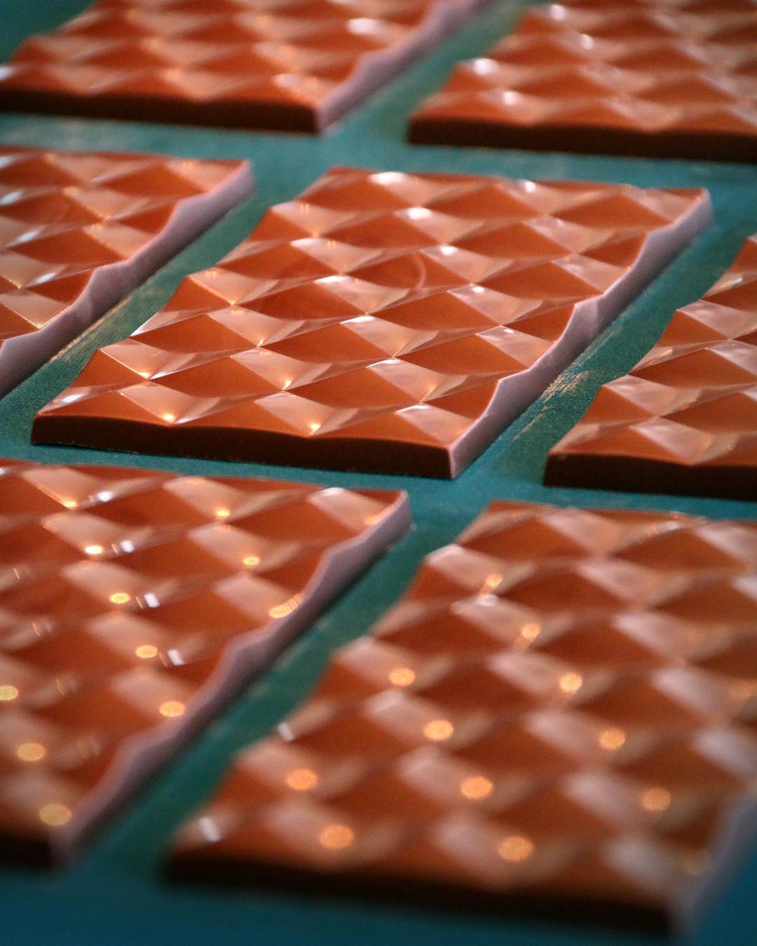 A group of Foundry Chocolate - Soconusco, Chiapas, Mexico 70% tiles on a table.
