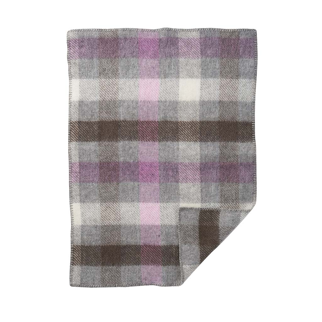 A high-quality Gotland Wool Baby Throw – Multi Pink blanket by Klippan, in a grey and purple plaid pattern on a white background.