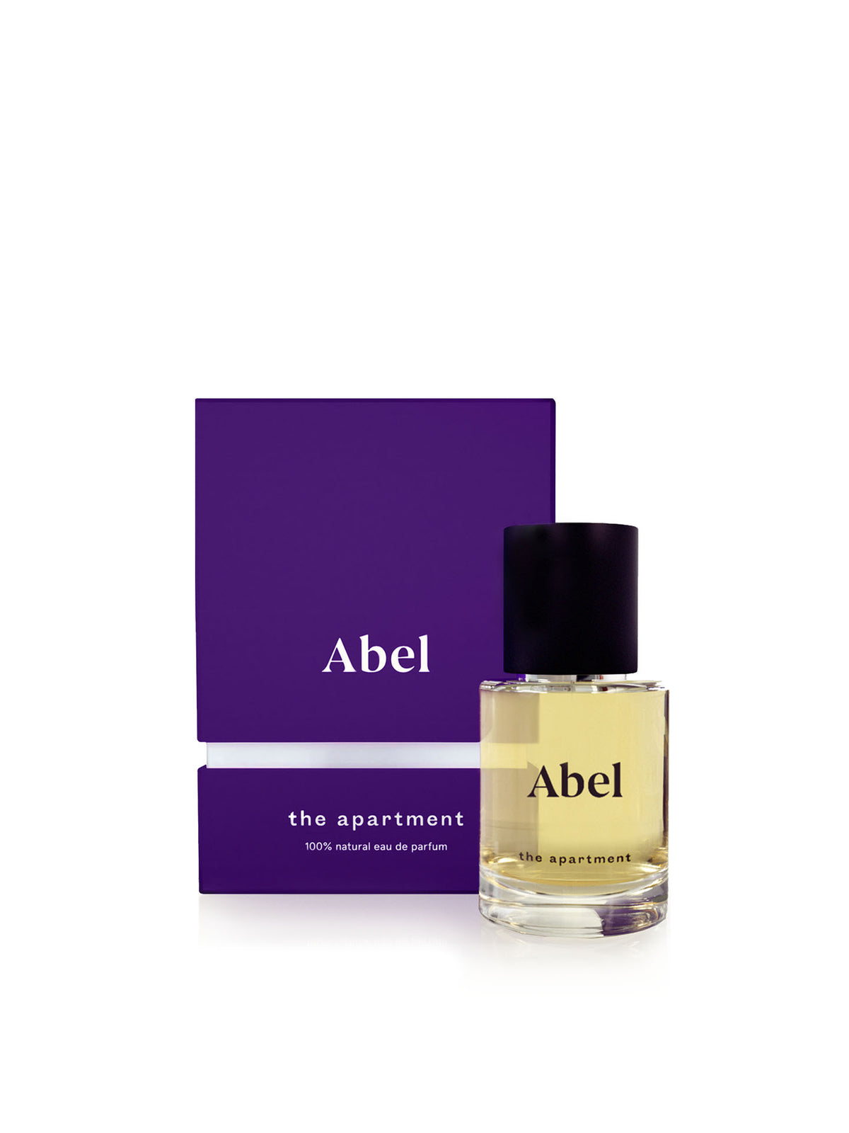 A bottle of Abel &quot;The Apartment&quot; Eau de Parfum is positioned before its elegant purple box, emanating a dark and sophisticated gourmand scent that captures the essence of Parisian chic.