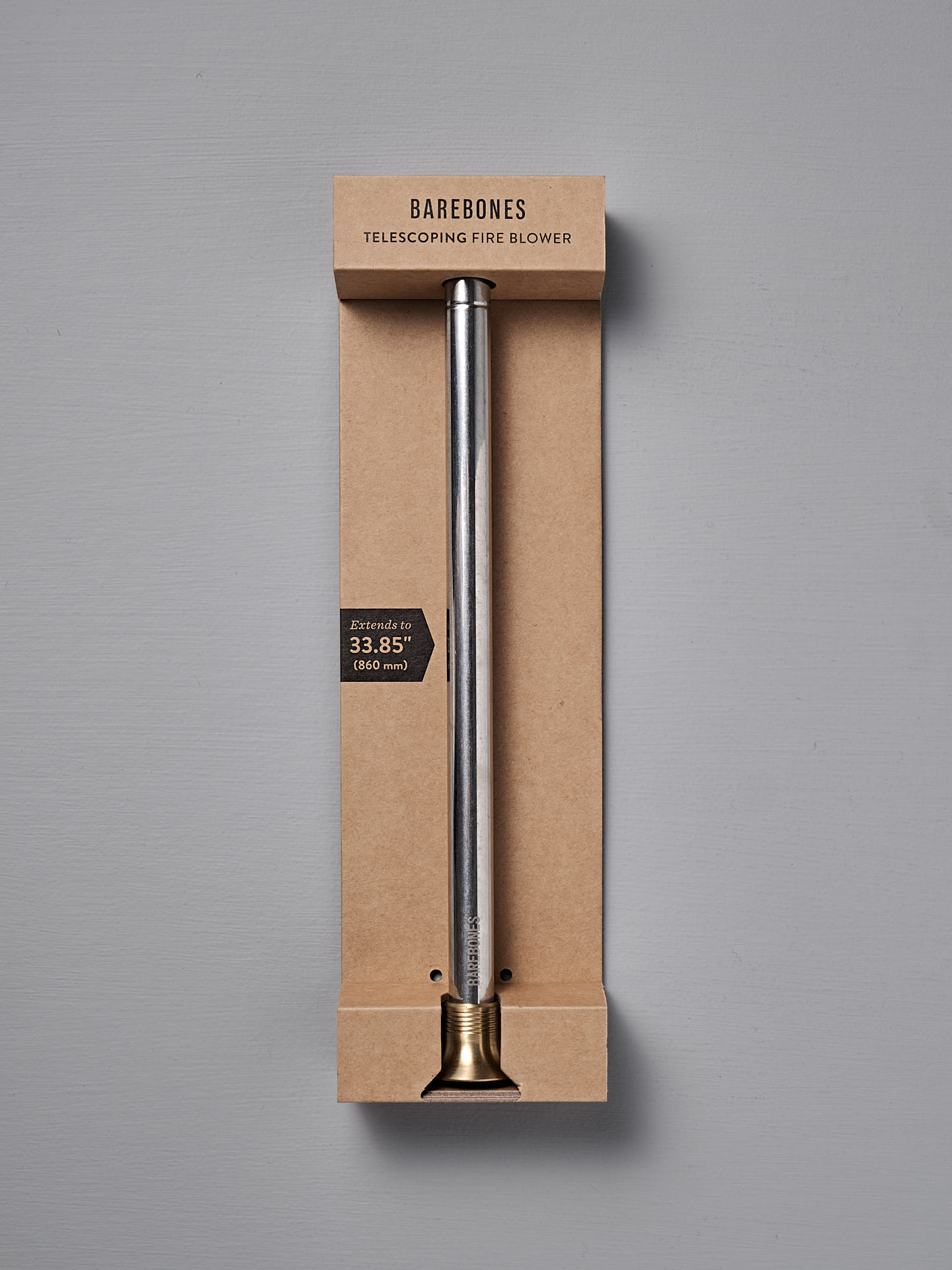 The Barebones Telescoping Fire Blower features a metal tube with brass tip, extends up to 33.85 inches, and is ideal for safely stoking campfires or fireplaces. Comes packaged and ready for outdoor use.