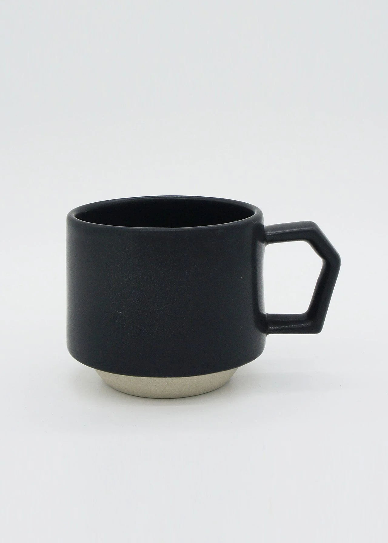 A stacking mug - black with a handle from CHIPS Inc.