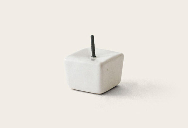 A Daiyo Rice Wax Candle &amp; Iron Stand Gift Box Set – 20pcs on a white surface.
