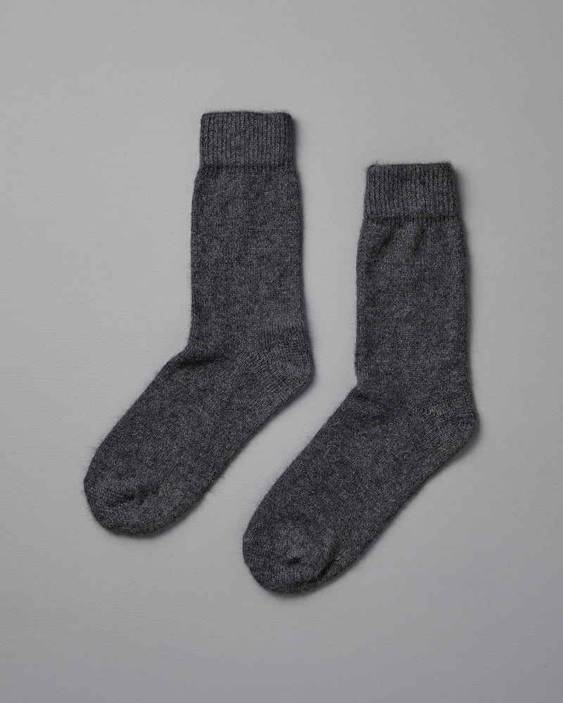 Francie's Possum Merino Socks in Charcoal, available in small, medium, and large sizes, are shown side by side on a plain light gray background.