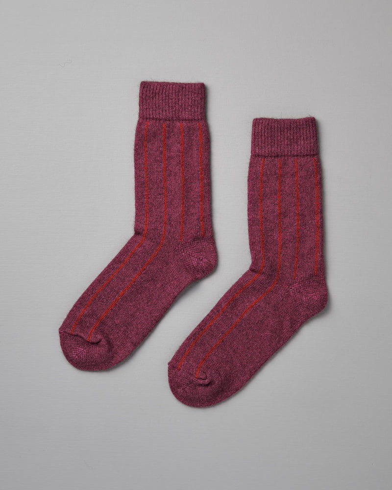 A pair of Francie Possum Merino Socks in Orchid & Poppy Stripe, displayed on a light grey background.