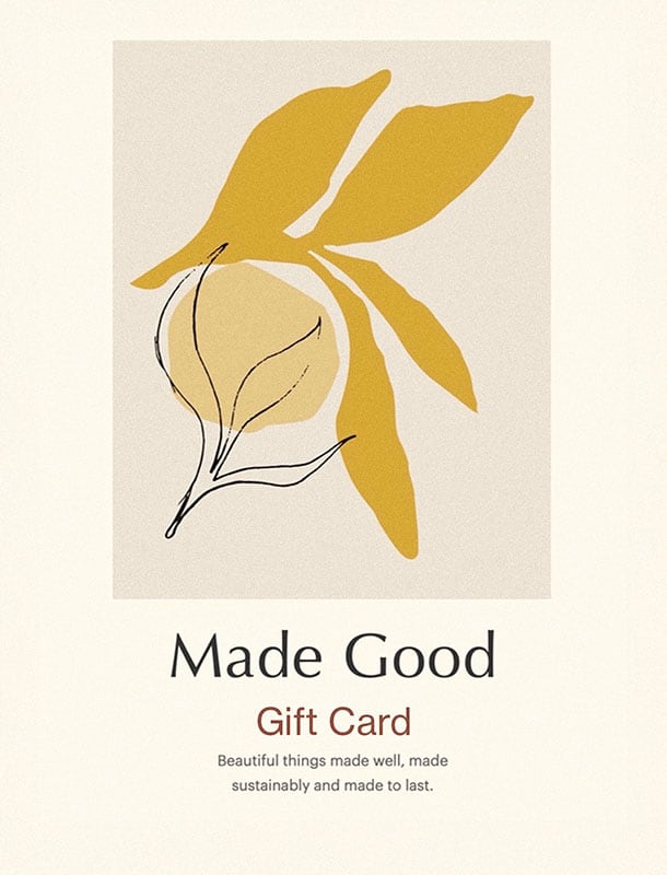 Gift card with an abstract yellow and black illustration of a flower. Text reads "Made Good Gift Card" and "Beautiful things made well, made sustainably and made to last.