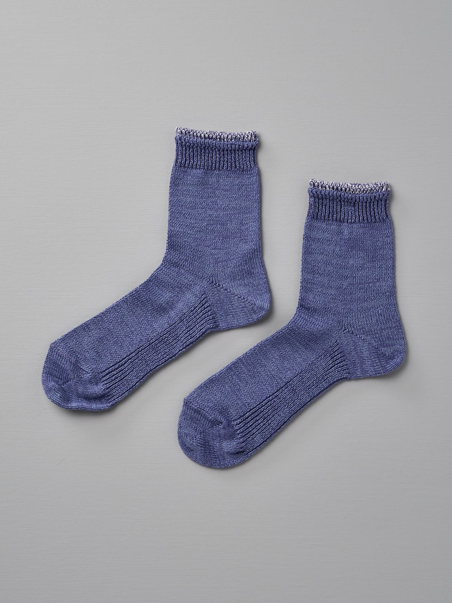 Pair of Mauna Kea Organic Top Switching Socks – Purple, sized EUR 39—42, placed side-by-side on a light gray background.