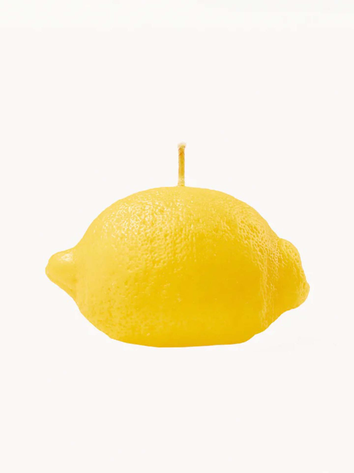 The Scented Lemon Candle by Nonna&#39;s Grocer is carefully crafted from natural soy wax and features a wick on top.