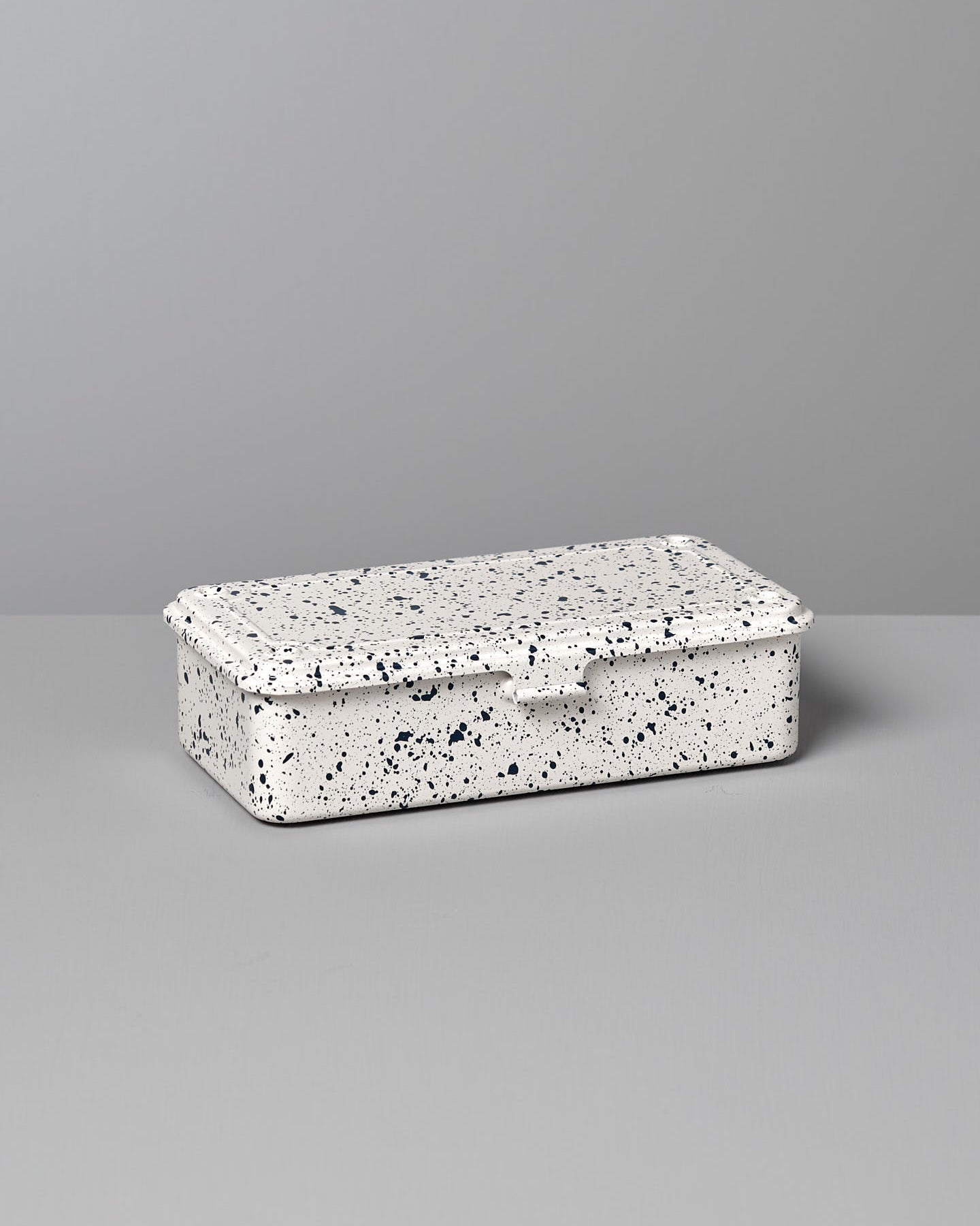 A versatile storage solution, the Mini Steel Toolbox T-190 – Japanese White Indigo by TOYO STEEL is crafted from powder-coated steel and placed on a gray surface against a matching backdrop.