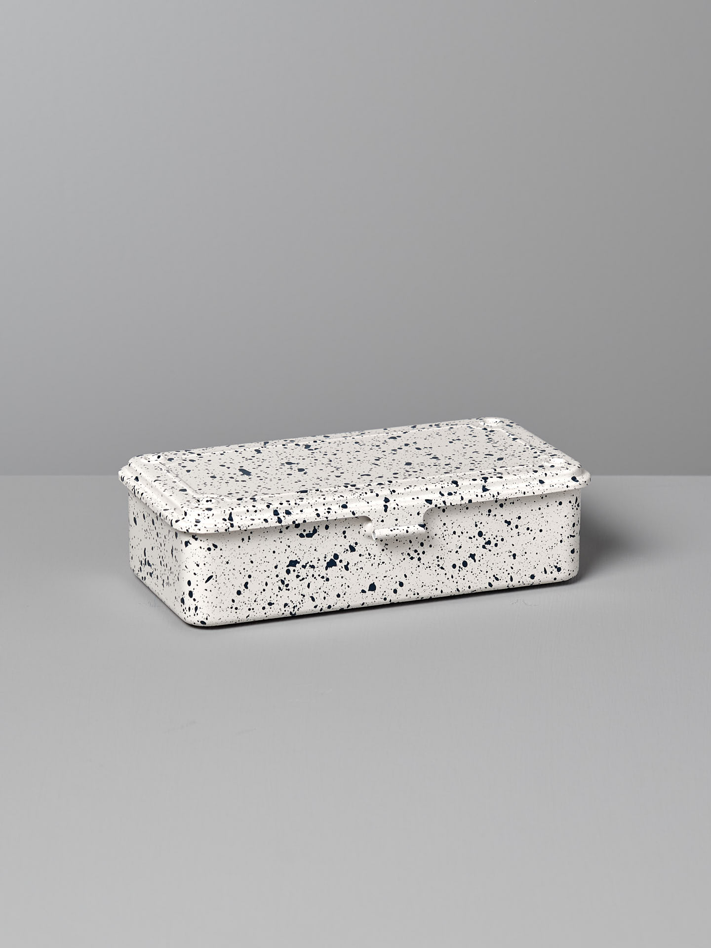 A versatile storage solution, the Mini Steel Toolbox T-190 – Japanese White Indigo by TOYO STEEL is crafted from powder-coated steel and placed on a gray surface against a matching backdrop.