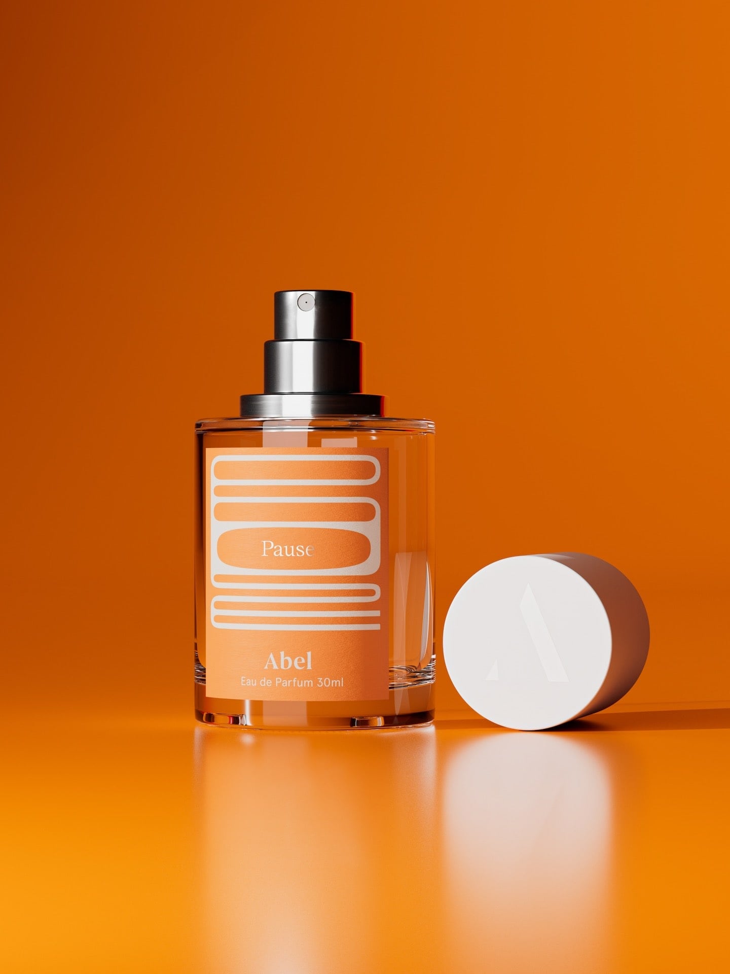 The "Pause – a confident, textured floral" by Abel, an award-winning fragrance, stands elegantly against an orange background.