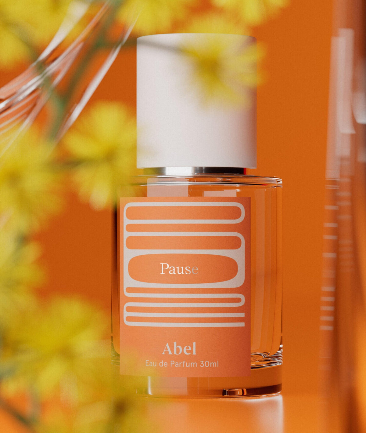 A bottle of Abel perfume with sustainable farming practices on an orange background.