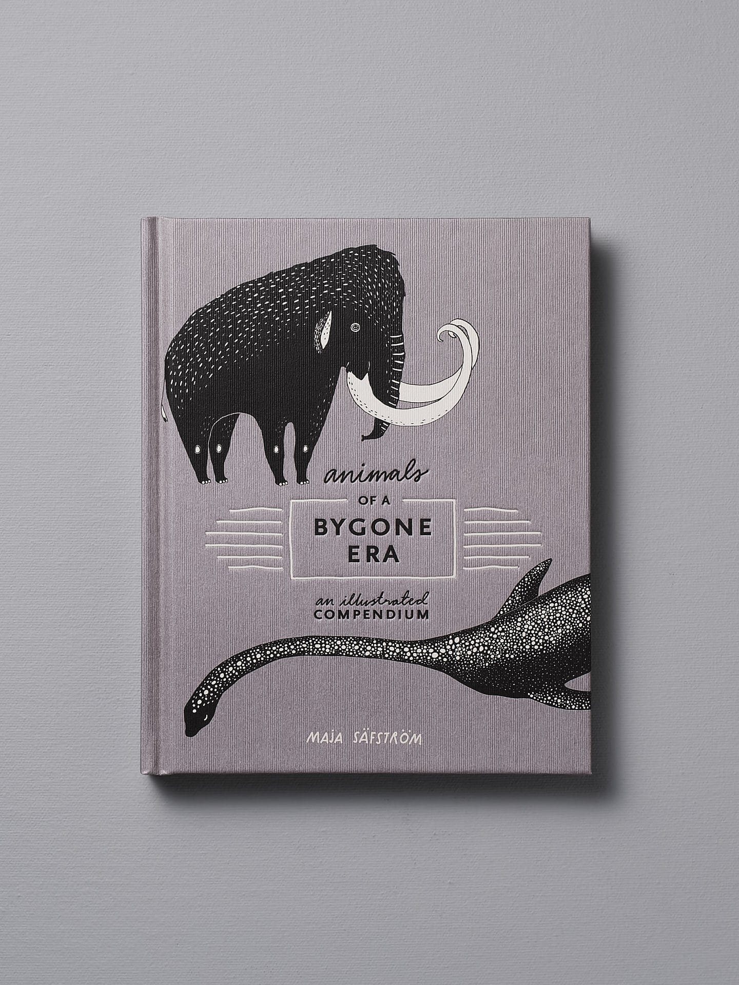 A Animals of a Bygone Era – An Illustrated Compendium with an elephant and a whale on it, by Maja Säfström.