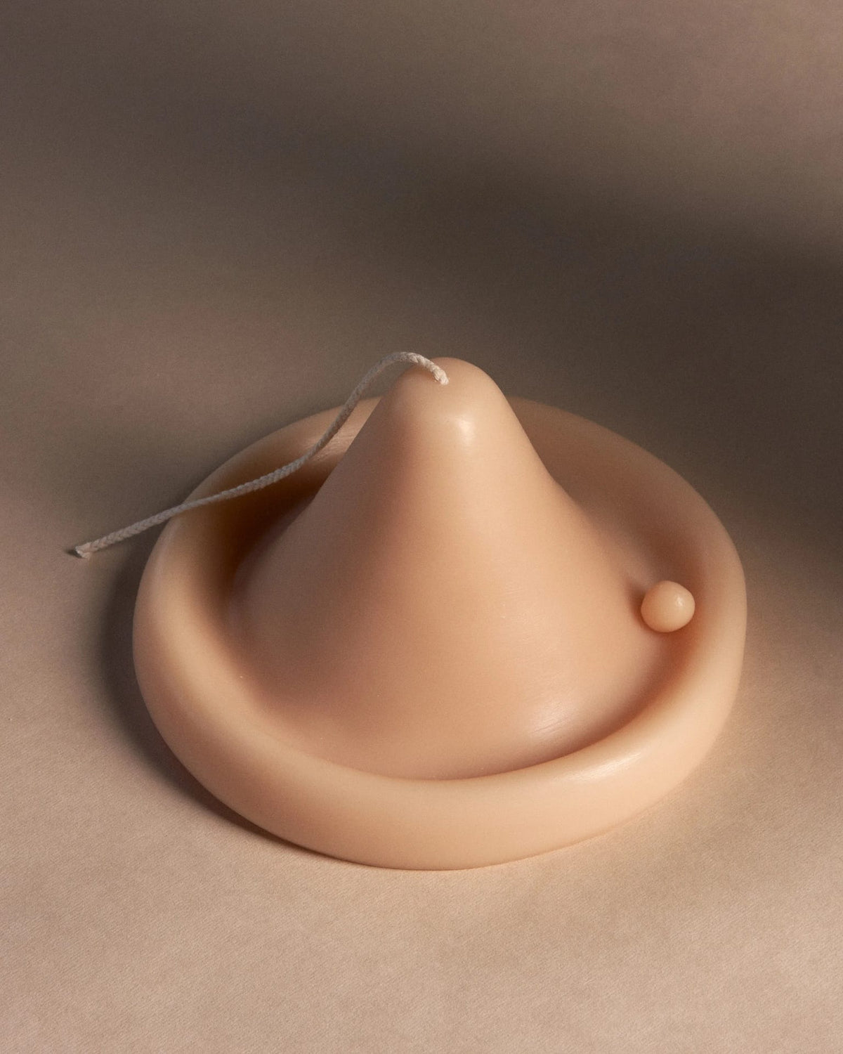 An Onno Candle with a horn on top of it.