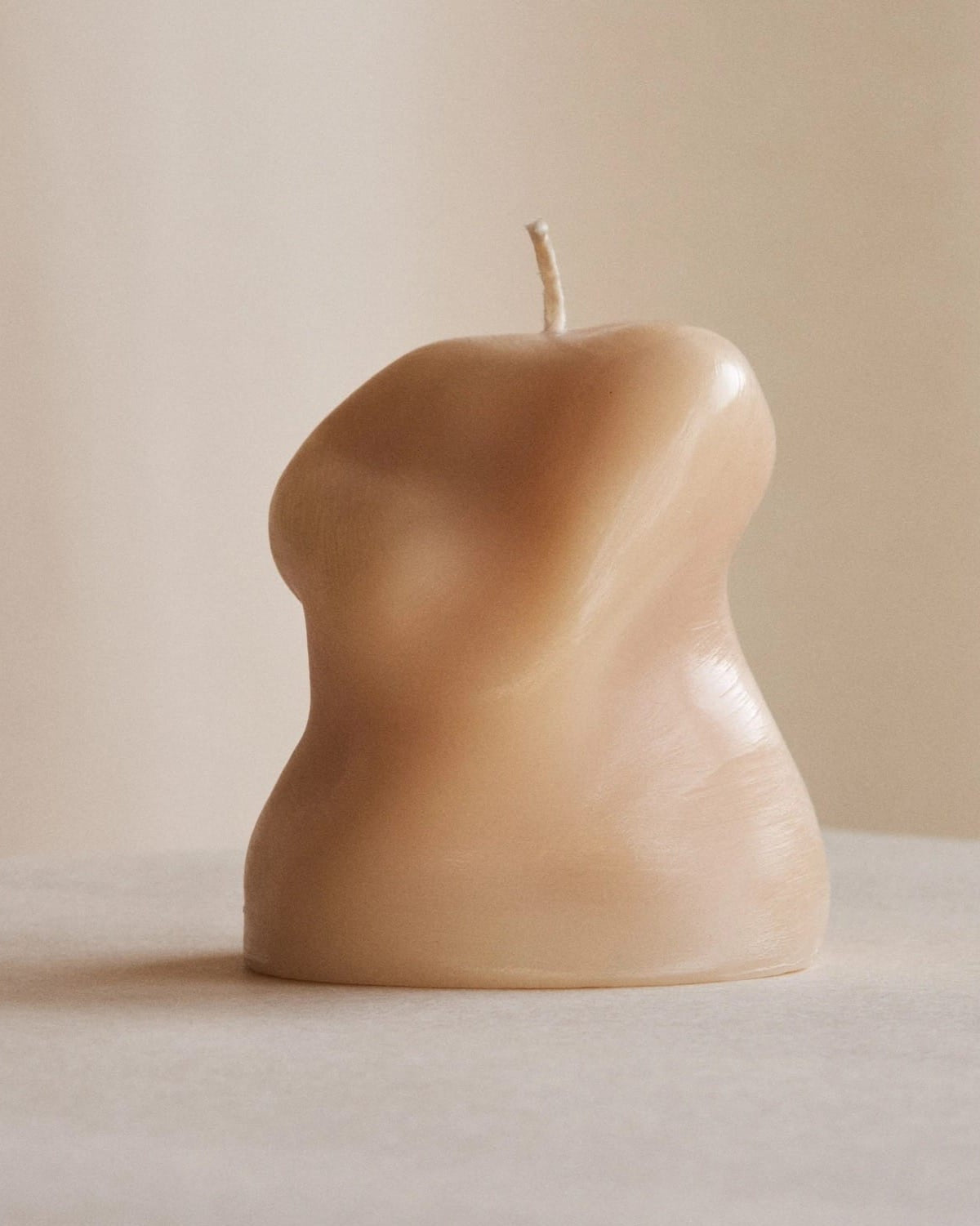 Three Sole Set candles sitting on a table next to each other. (Brand: ann vincent)