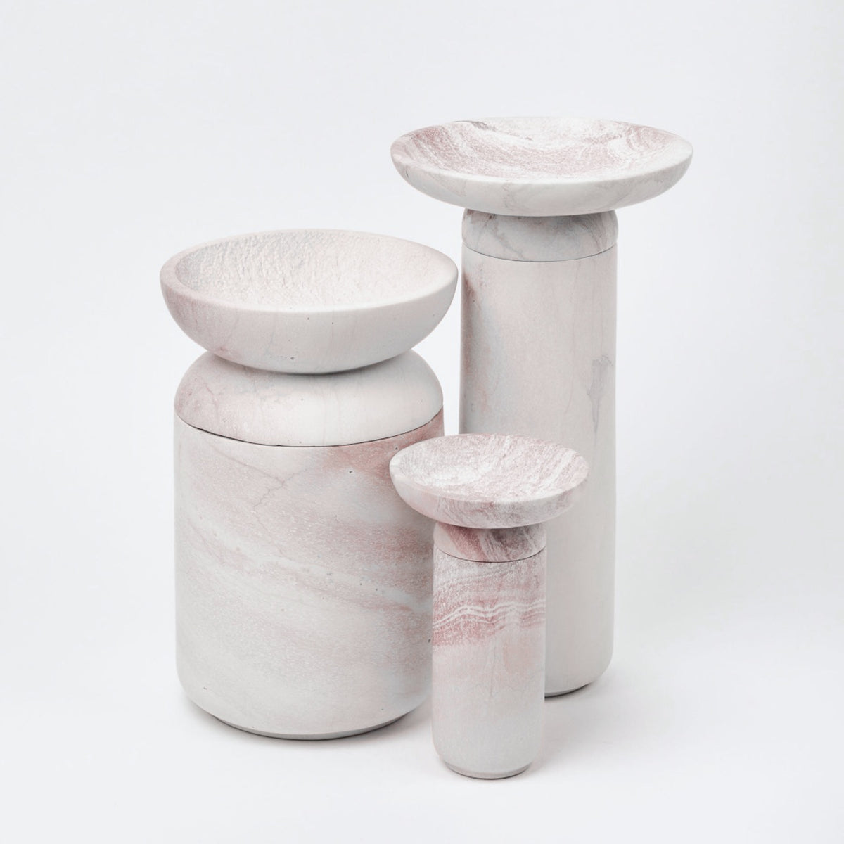 Three Asili Amina Bowl Set Tall – Pink vases on a white surface.