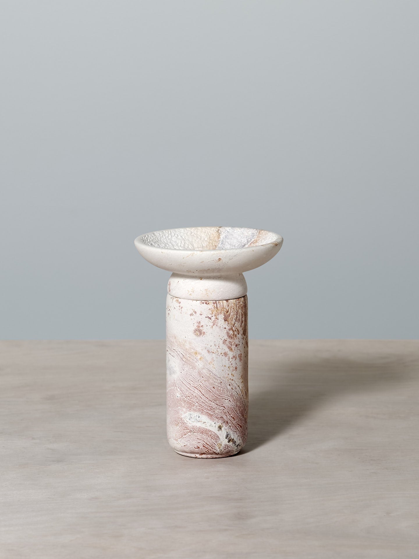 An Asili Amina Bowl Set Small – Pink sitting on a table.