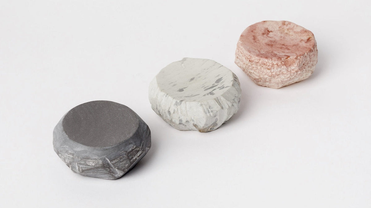 A set of three Textured Dish Set – Malachite stools on a white surface by Asili.