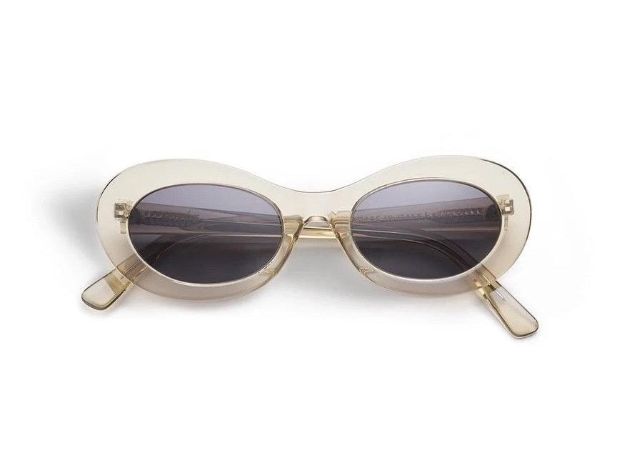 A pair of auór Paloma Sunglasses – Tea with black lenses on a white background.