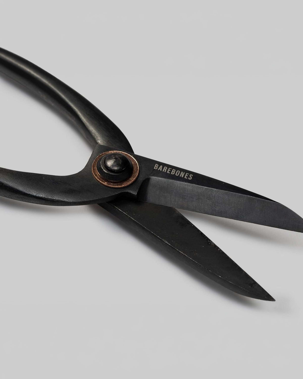 A pair of Barebones Artisan Pruning Shears on a white surface.