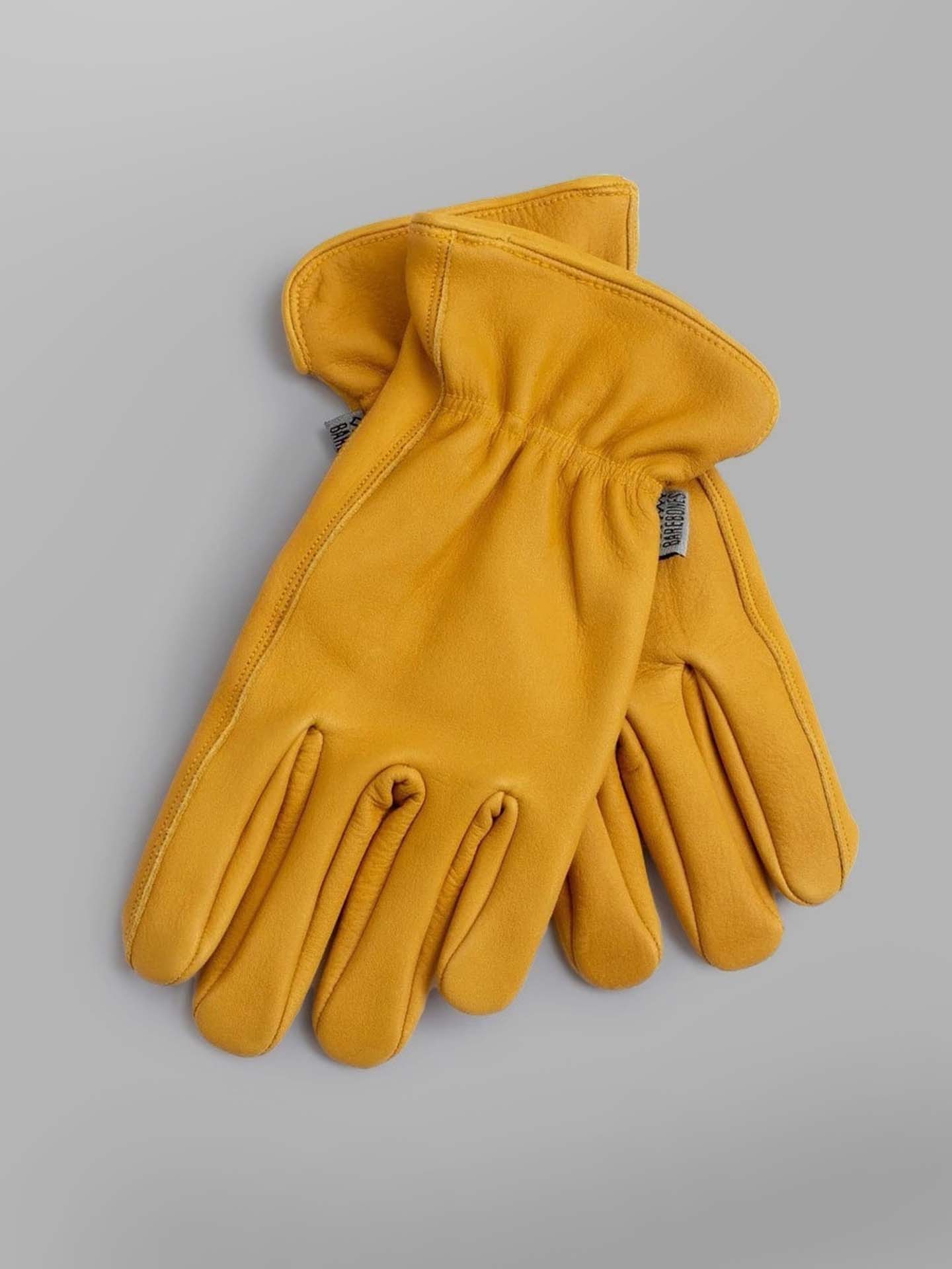 A pair of Barebones Classic Work Gloves – Natural Yellow on a white background.