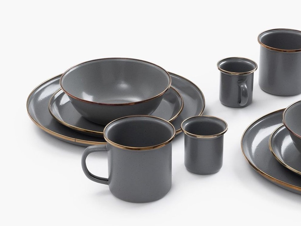 A set of Barebones Enamel Mug - Slate Grey (Set of 2) dinnerware on a white surface.