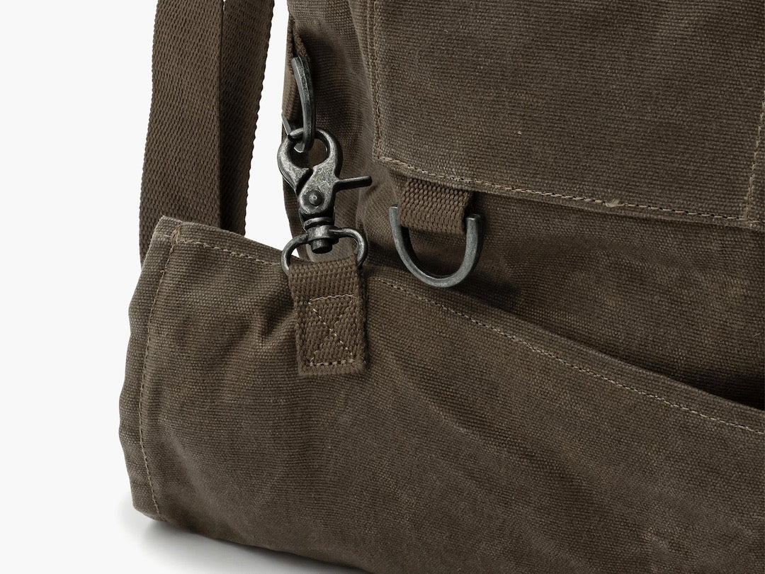 The back of a Barebones Gathering Bag - Khaki with a strap.