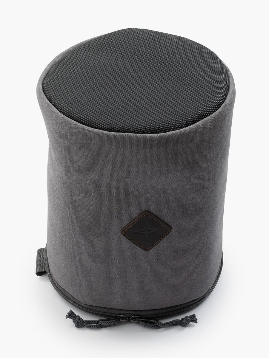 A Barebones Lantern Storage Bag – Waxed Canvas with a black zipper.