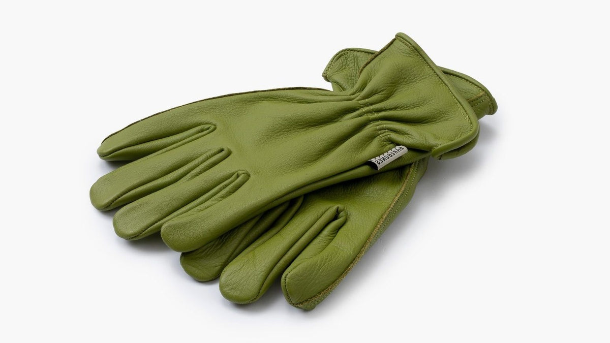A pair of Classic Work Gloves – Olive by Barebones on a white background.