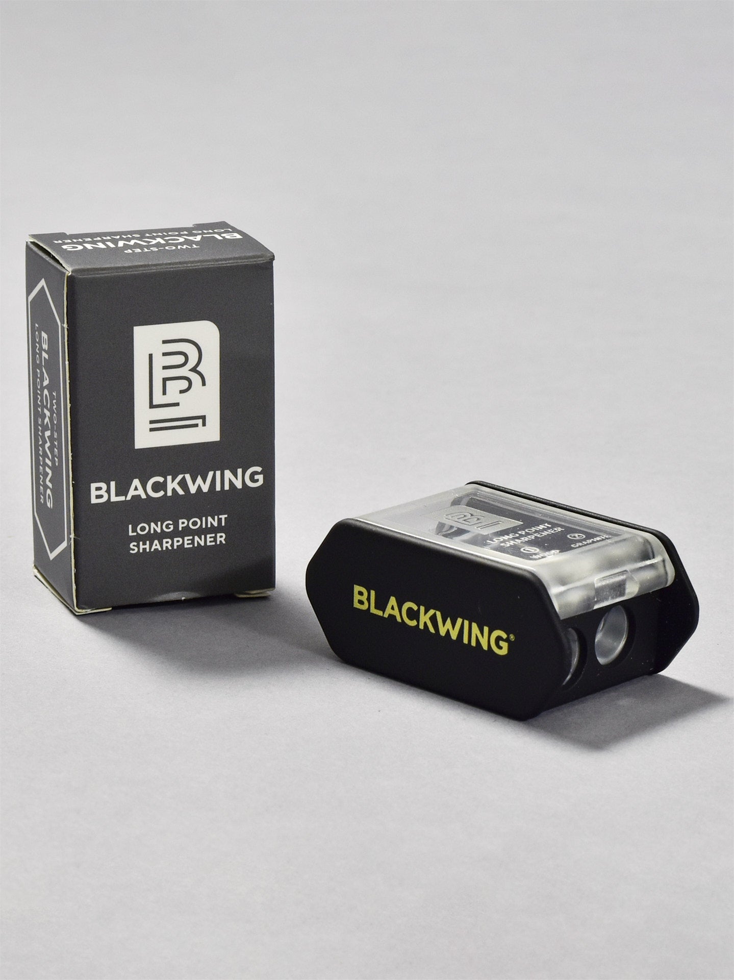 A Palomino Blackwing Long Point Pencil Sharpener box with a Blackwing logo on it.