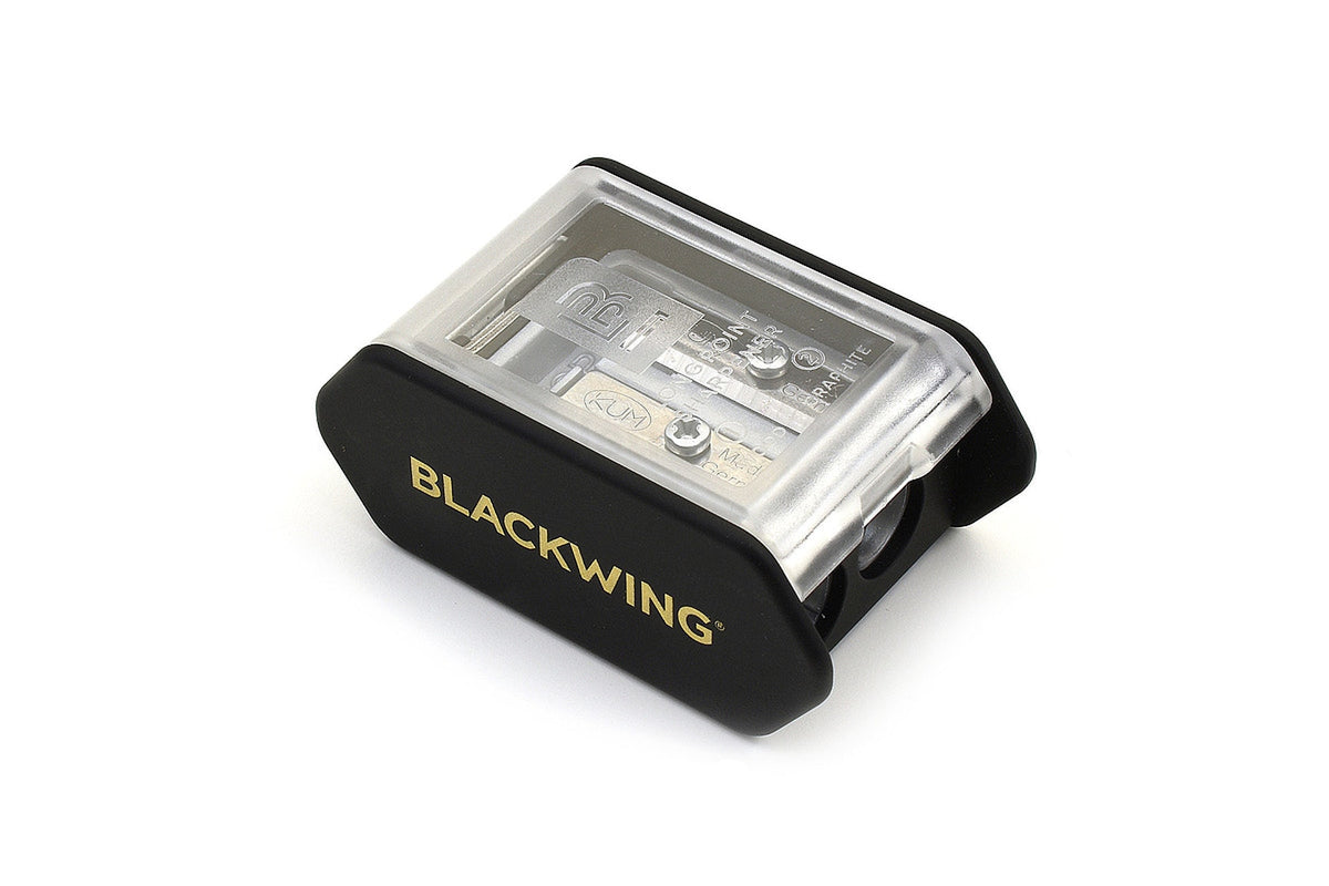 A black Blackwing Long Point Pencil Sharpener with the word Palomino Blackwing on it.