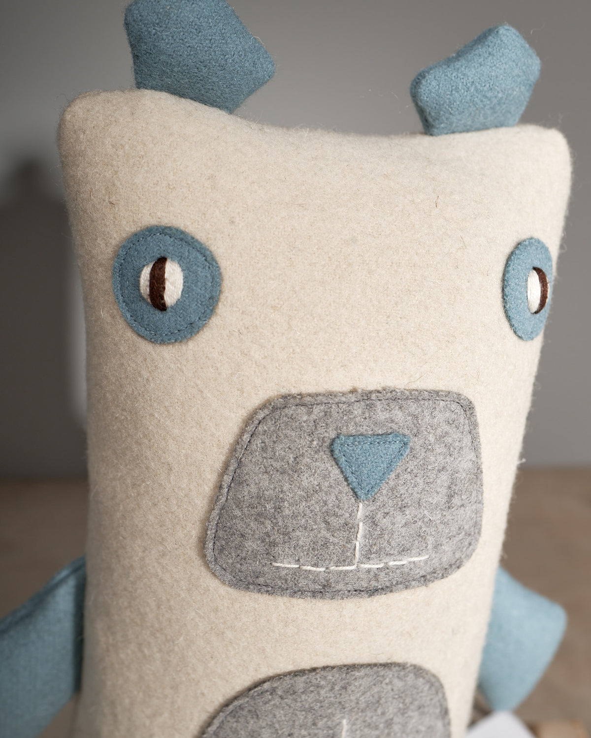 A NASH, the North American Polar Bear stuffed animal with blue eyes and a blue nose.