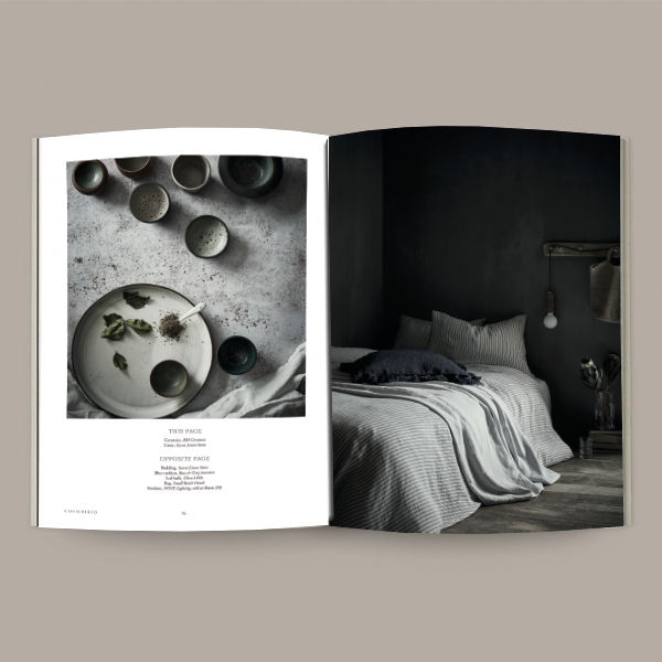 Considered Magazine – Vol 2 with a bed and a bedside table.