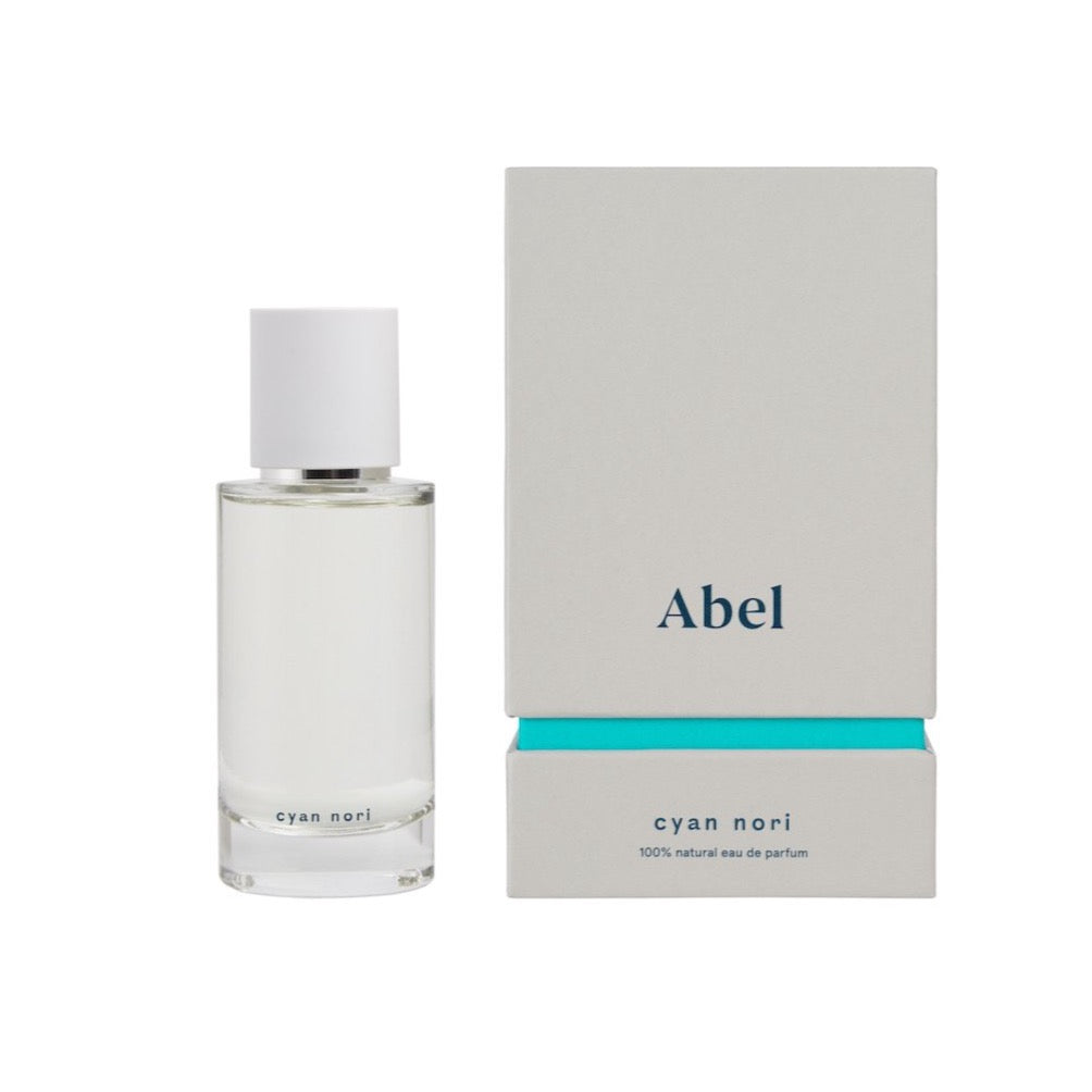 A functional bottle of Cyan Nori – a sweet, salty musk by Abel with a fragrant box next to it.