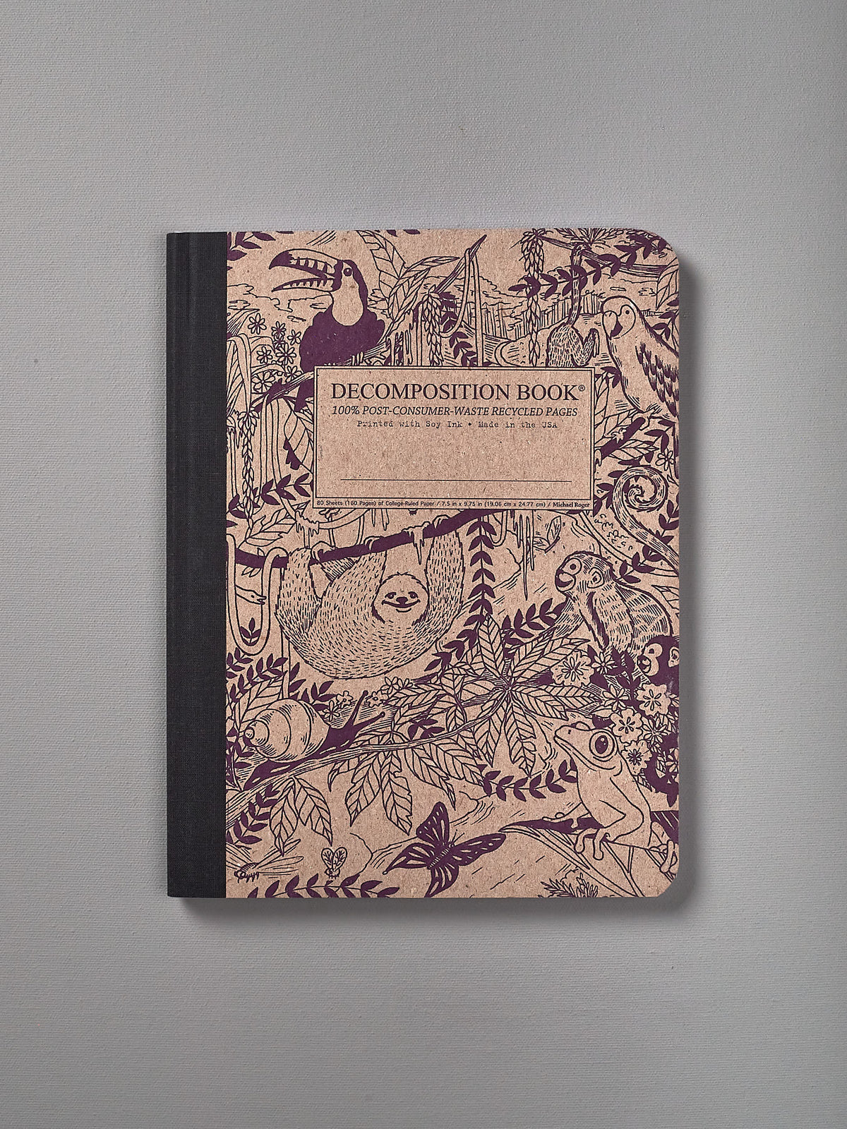 A Decomposition Recycled Notebook – Large/Ruled (Rainforest) with an illustration of a tree and plants.