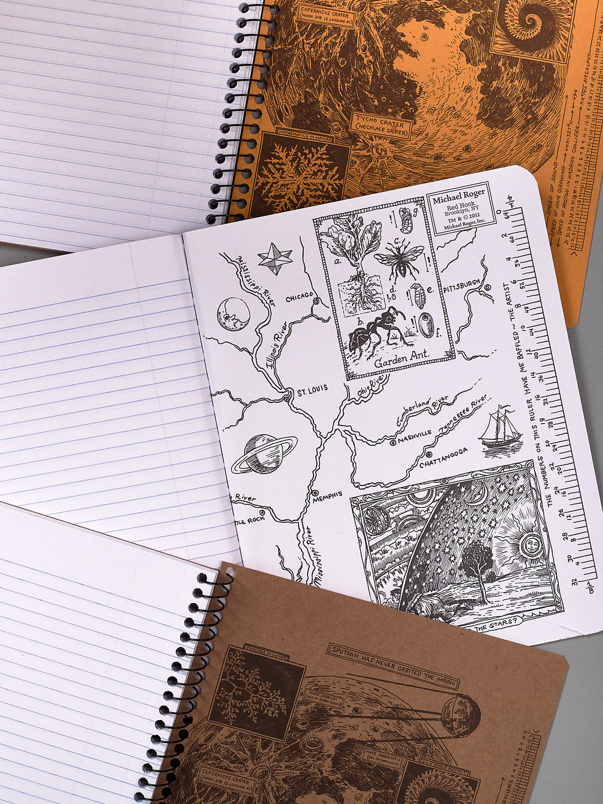 A Decomposition Recycled Notebook – Large/Ruled (Sunflowers) with a map and drawings on it.