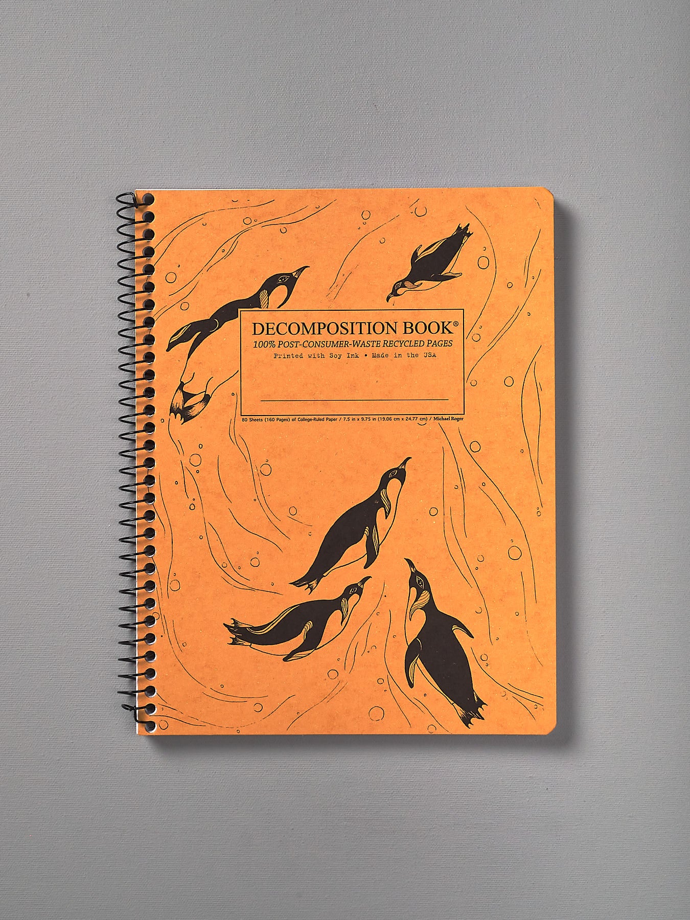 A Decomposition Recycled Notebook – Large/Ruled (King Penguins) with penguins on it.