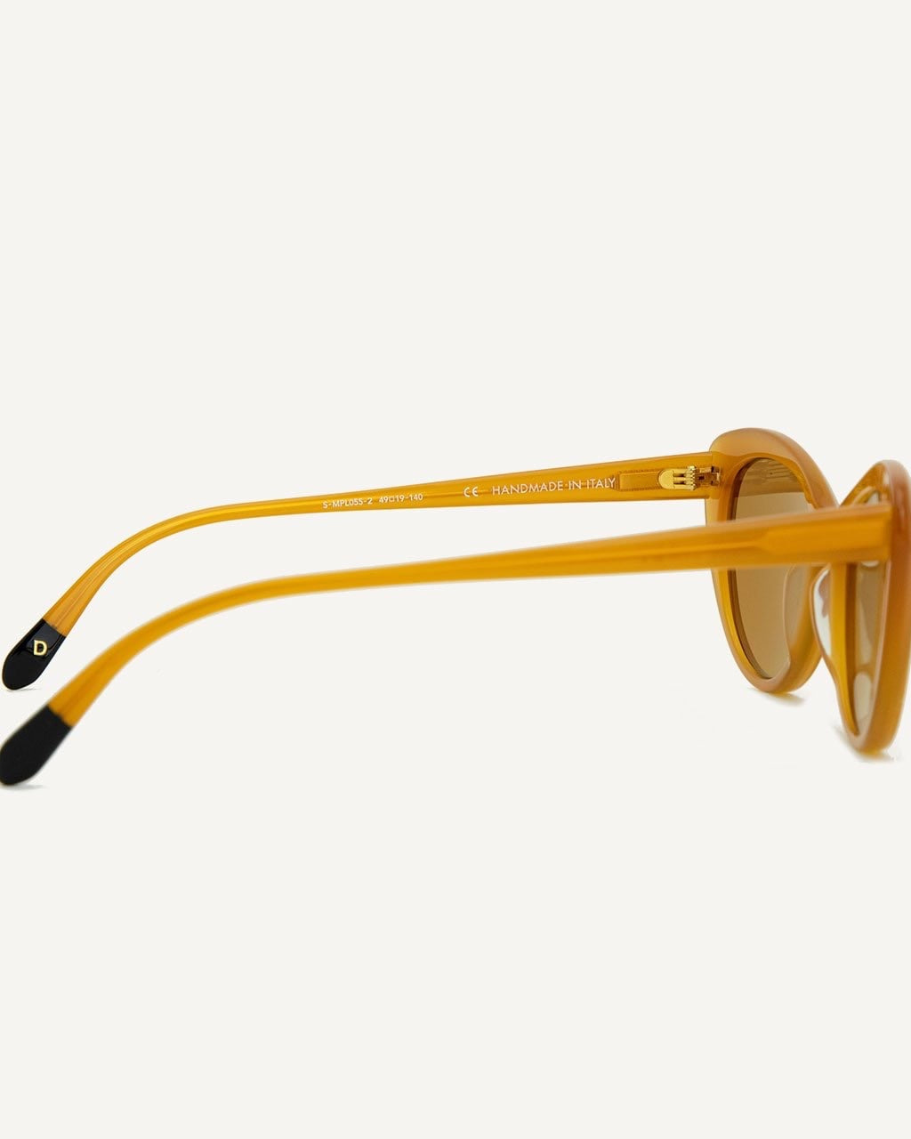 A pair of Montpellier Sunglasses – Caramel by Dick Moby on a white background.