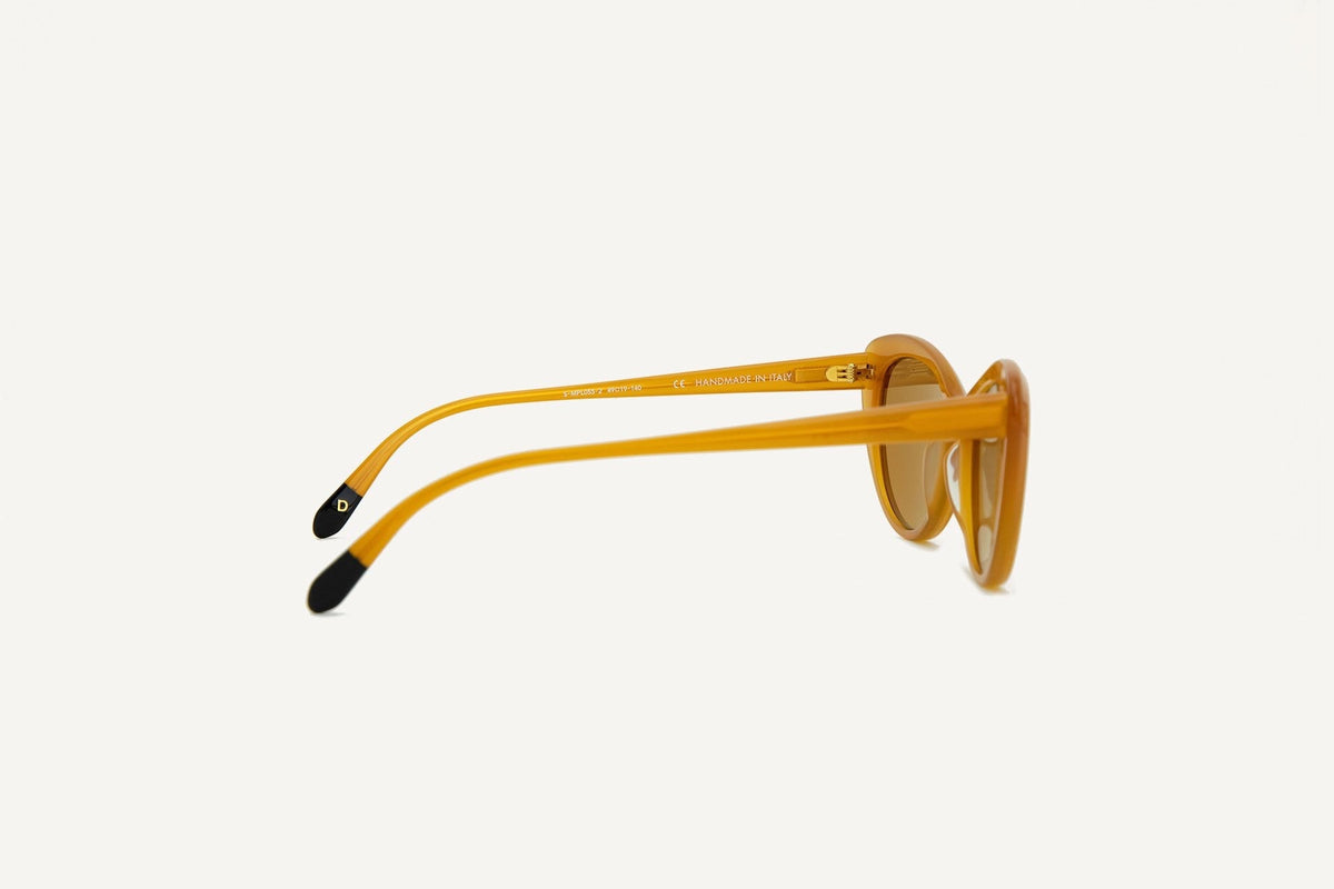 A pair of Montpellier Sunglasses – Caramel by Dick Moby on a white background.