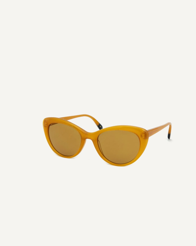 A pair of Montpellier Sunglasses – Caramel by Dick Moby on a white background.