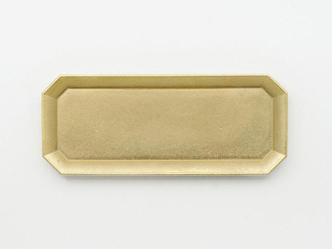 A Futagami Stationery Tray – Solid Brass on a white surface.