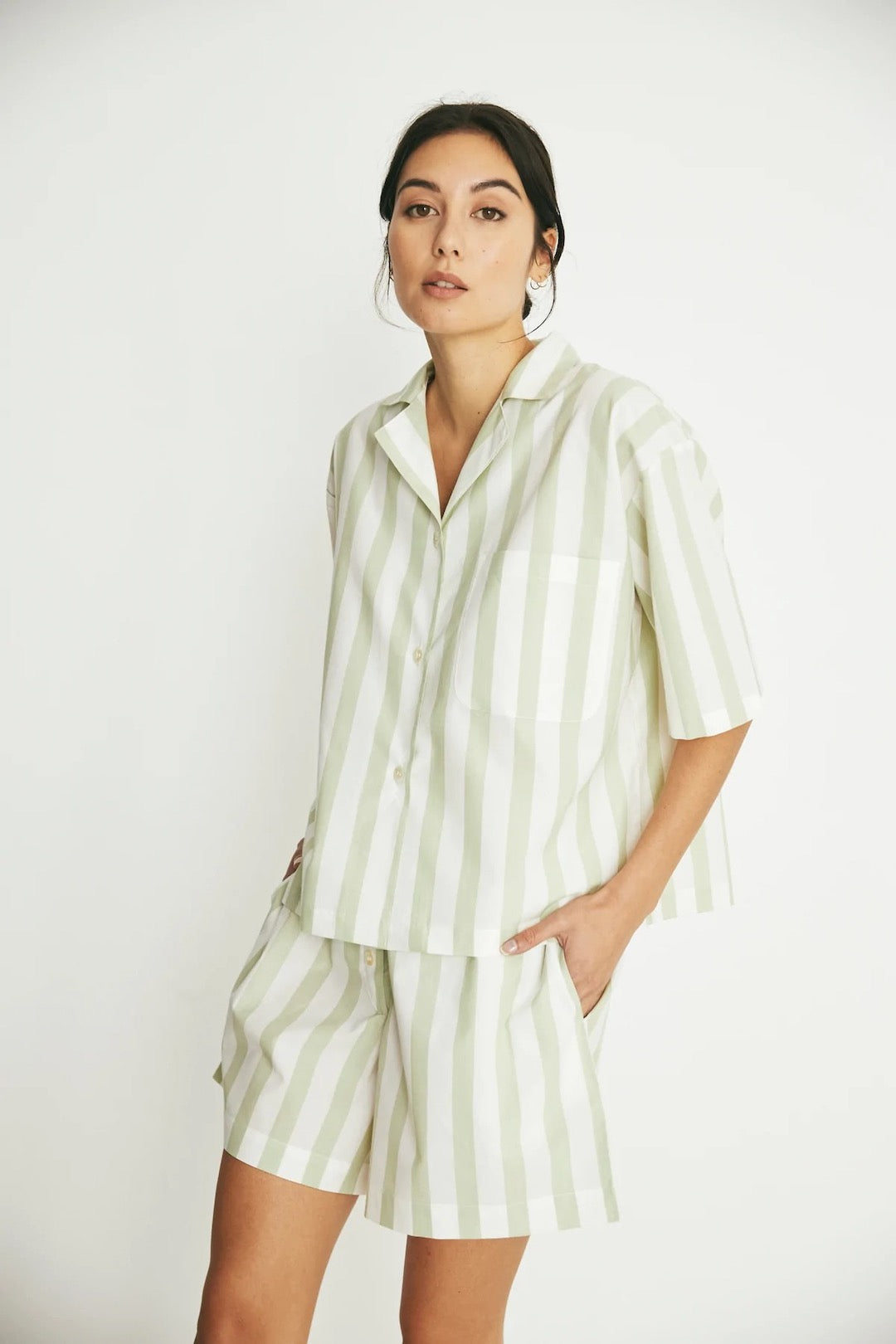 The model is wearing a Camilla Set - Pear Stripe pajama set by general sleep.
