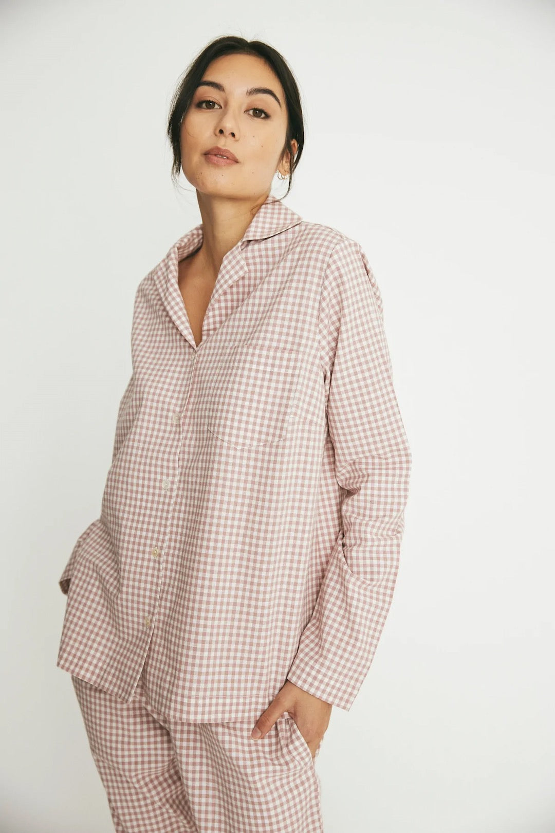 The model is wearing a general sleep Classic Set - Rose Gingham pyjama set.