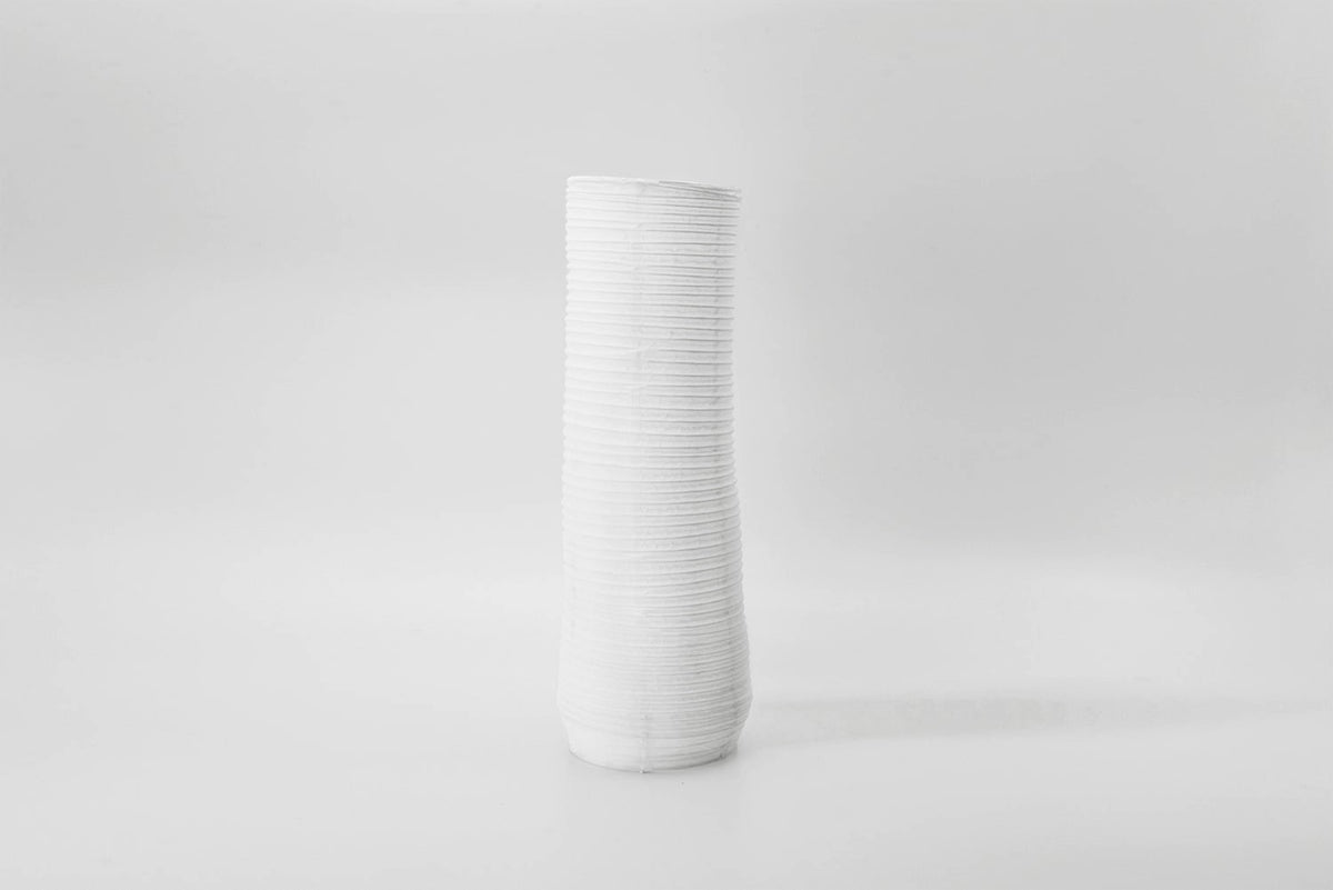 A Nobi-tsutsu Paper Vase – №3, made by Hayashi Kougei, sitting on a white surface.