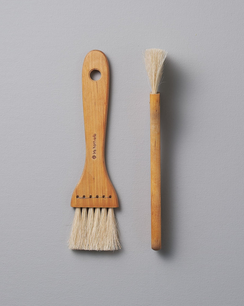 A Pastry Brush – Waxed Birch & Horsehair and a Pastry Brush – Waxed Birch & Horsehair next to each other (brand: Iris Hantverk).