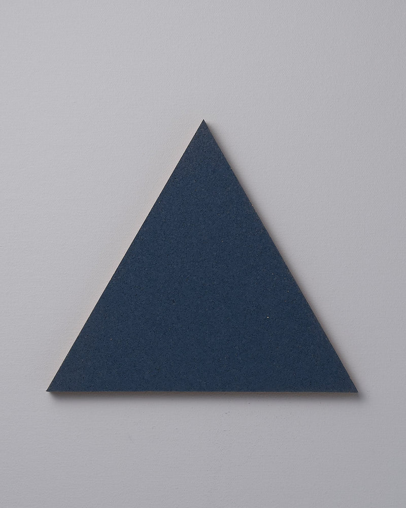 An Iris Hantverk Orion Blue trivet on a white background.
