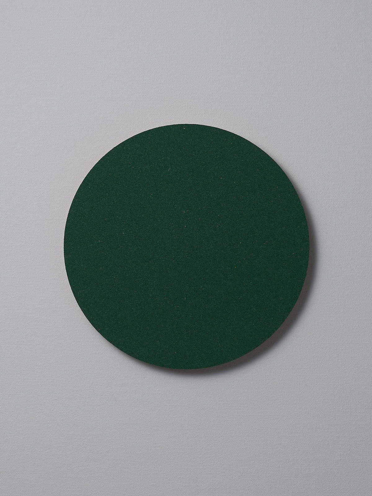 A Trivet - Racing Green by Iris Hantverk on a white surface.